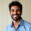 Portrait of David Patel, 55, looking fit and energetic.